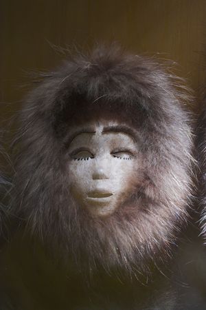 Traditional eskimo mask made of skin and fur