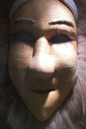 Traditional eskimo mask made of skin and furの写真素材