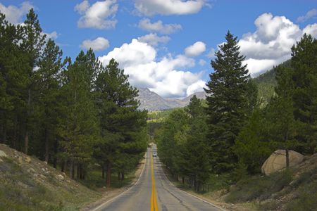 Roads in Cordeliers surrounded by colorful mountains prairies forests and tundraの写真素材
