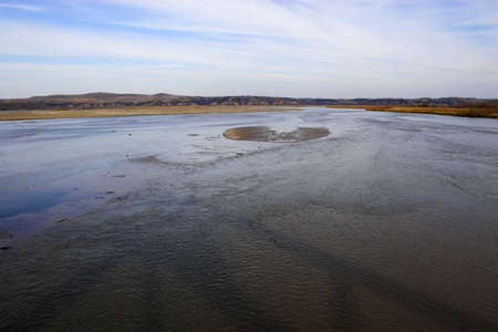 Countryside lakes and rivers surrounded by colorful prairieの写真素材