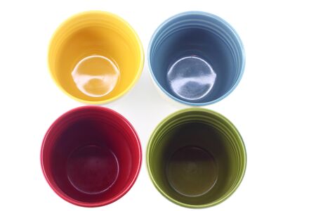 Four tea cups on the white backgroundの写真素材