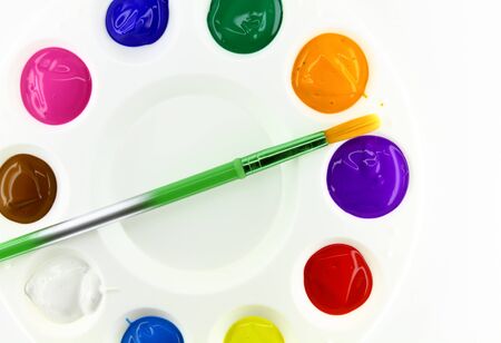 Round artist palette on white backgroundの写真素材