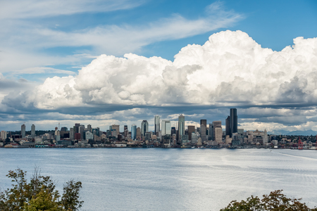 Billowing clouds hover over the Seattle skyline.の写真素材