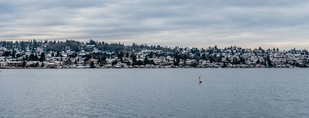 Snow covers rooftops of homes in Renton, Washington.の写真素材