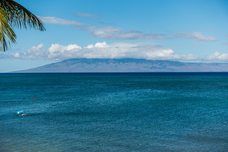 A view of the island of Lanai from Maui, Hawaii.の写真素材