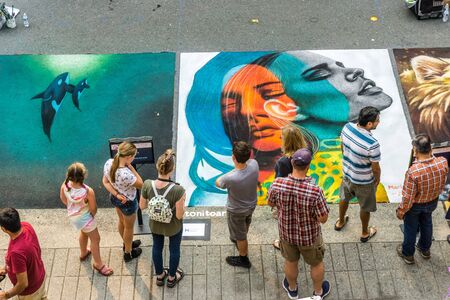 REDMOND, WA. /  USA - AUGUST 19TH 2018: Spectators enjoy art at the Chalkfest event in Redmond, Washington.The location is Redmond Town Center.のeditorial素材