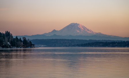 A view of Mount Rainier at sunset. Photo take from Seward Park in Seattle, Washington.の写真素材