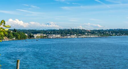 A view of the marina in Des Moines, Washington with Mount Rainier in the distance.の写真素材