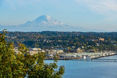 A view of Mount Rainier with Des Moinese, Washington below.