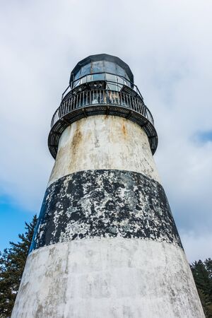 One of the two lighthouses at Cape Disappointment State park in Washington State.の写真素材