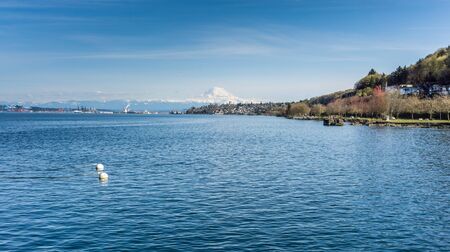 A view of the Port of Tacoma and Mount Rainier from Ruston, Washington.の写真素材
