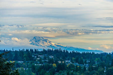 A blanked of clouds covers Mount Rainier in Washington State.の写真素材
