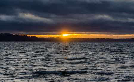 Dark evening clouds over the Puget Sound in Washington State.の写真素材