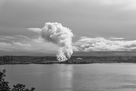 Steam rises from a factory near the Port of Tacoma.