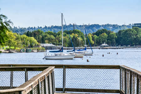Boats are anchored along the shore at Coulon Park in Renton, Washington.の写真素材