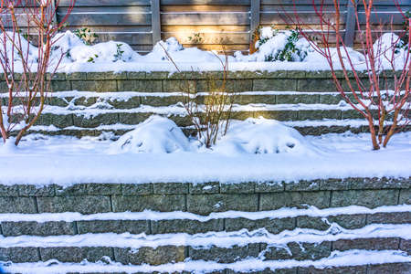 Snow lies on a wall in Burien, Washington.の写真素材