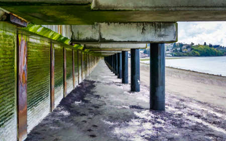 Under the boardwalk at Redondo Beach, Washington at low tide. Photo illustration.の写真素材