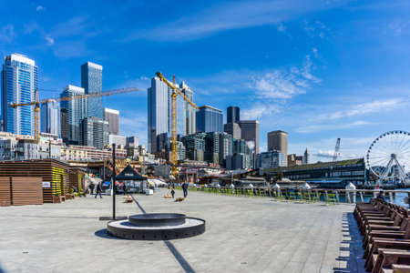 Pier 62 and tall skyscrapers at the waterfront in Seattle, Washington.の写真素材