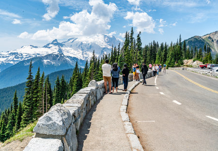 WASHINGTON STATE., USA  -July 8,  2023: Visitors appreciate the granduer of Mount Rainier in Washington State.の写真素材