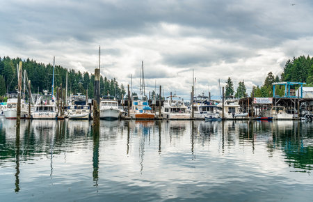 Boats are moored at a marina in Gig Harbor, Washington.