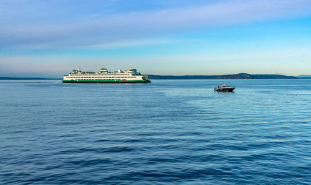 A ferry moves toward the dock in Edmonds, Washington.の写真素材