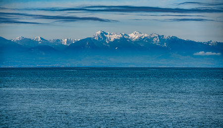 A view of the Olympic Mountain Range from Oak Harbor, Washington.