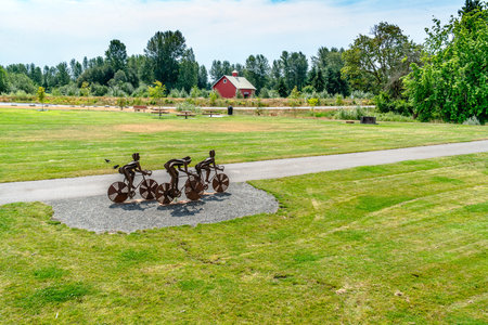 A view of art and a building at Van Doren's Landing Park in Kent, washington.の写真素材