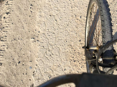 Bicycle wheel on the roadの写真素材