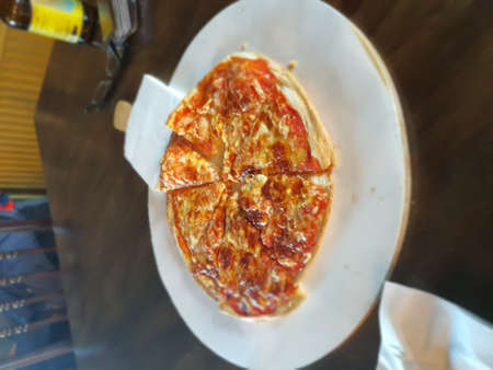 Mozzarella and tomato sauce pizzaの写真素材