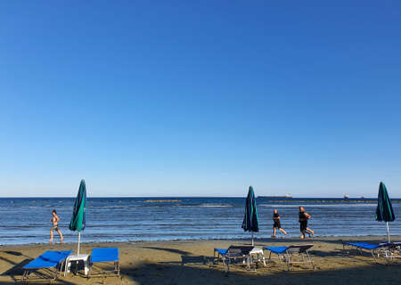 Running on Oroklini beach in Larnaca