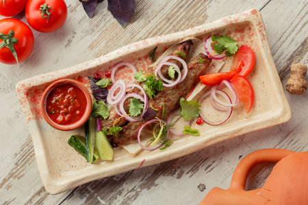 Photographing food flat lay Caucasian cuisine. Delicious Georgian dish on the table.の写真素材