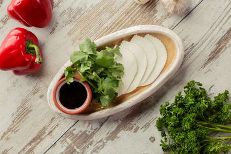 Georgian dish on the table photo for the menu of Eastern Caucasian cuisine. Sliced suluguni.の写真素材
