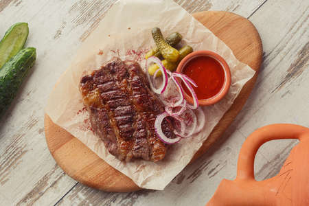 Georgian dish on the table photo for the menu of Eastern Caucasian cuisine. Beef steakの写真素材