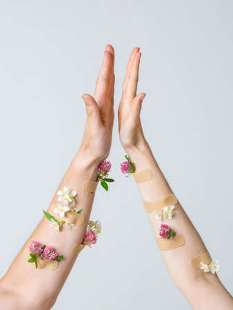 Gesture like man's and woman's hand giving each other high five. Gender equality. Photography for...