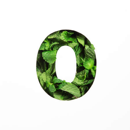 Green mint number zero made of natural leafs and paper cut null shape isolated on white. Typeface...