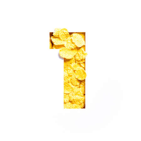 Number one made of corn flakes, paper cut in shape of first numeral isolated on white. Typeface for...
