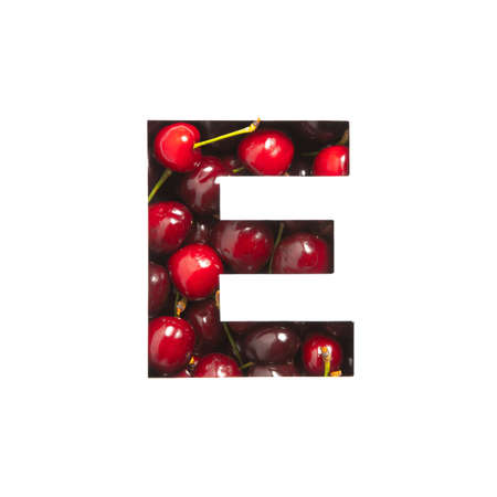 Cherries alphabet. Letter E made of berries and paper cut isolated on white. Typeface for organic food market. Vitaminsの写真素材