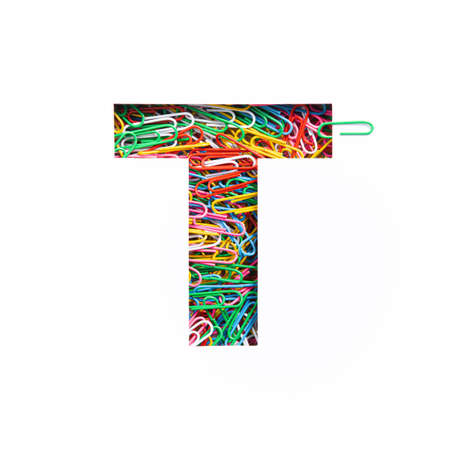 Letter T of English alphabet of colourful rainbow paperclips, white cut paper sheet. Typeface of office suppliesの写真素材