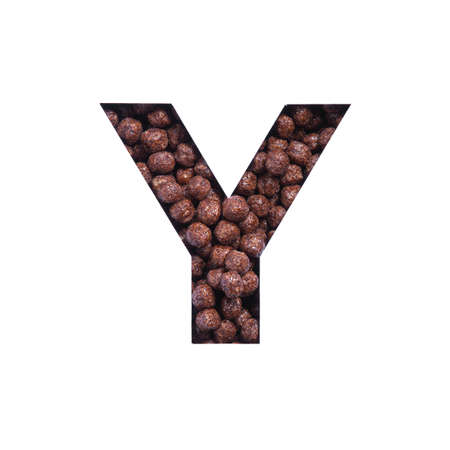 Letter Y of alphabet made of bio chocolate cereal balls and paper cut isolated on white. Typeface for healthy food storeの写真素材