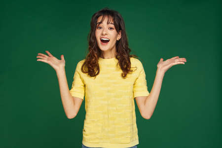 Wow emotion. Excited happy modern young girl surprised by unbelievable amazing online store offer on...