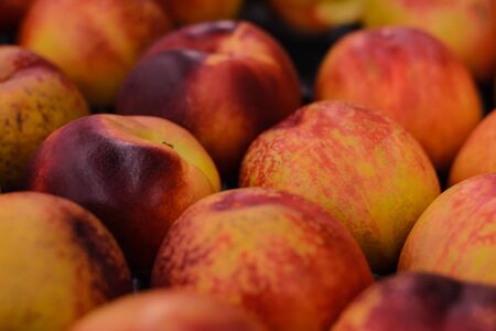 Box of the delicious and organic peach の写真素材