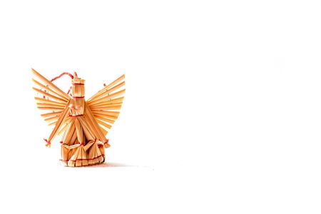 Beautiful straw angel on white bacground の写真素材