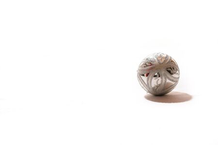 Beautiful silver christmas ball on white background の写真素材