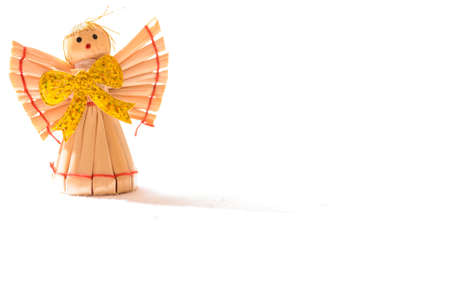 Beautiful straw angel on white bacground の写真素材