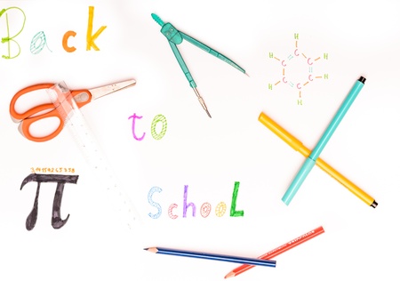 Hand written sign back to school on white background with scissors, pencil, compasses, spirit pencil...
