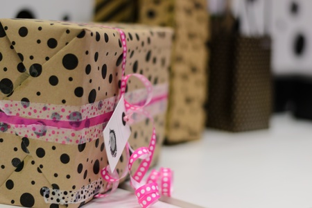 White gift with black dots pattern for wedding christmas and celebration.