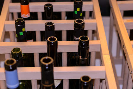 Detail of wine bottles in the wodden box 