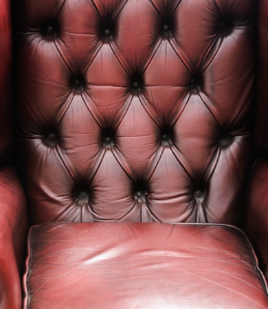Comfortable dark red Leather Chair Abstractの写真素材