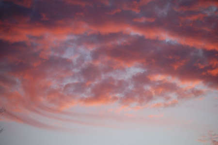 red cloud with blue sky