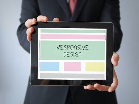 responsive design concept: businessman with responsive wireframeの写真素材